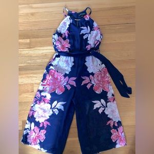 Girls Jumpsuit. Navy blue with white and pink flowers